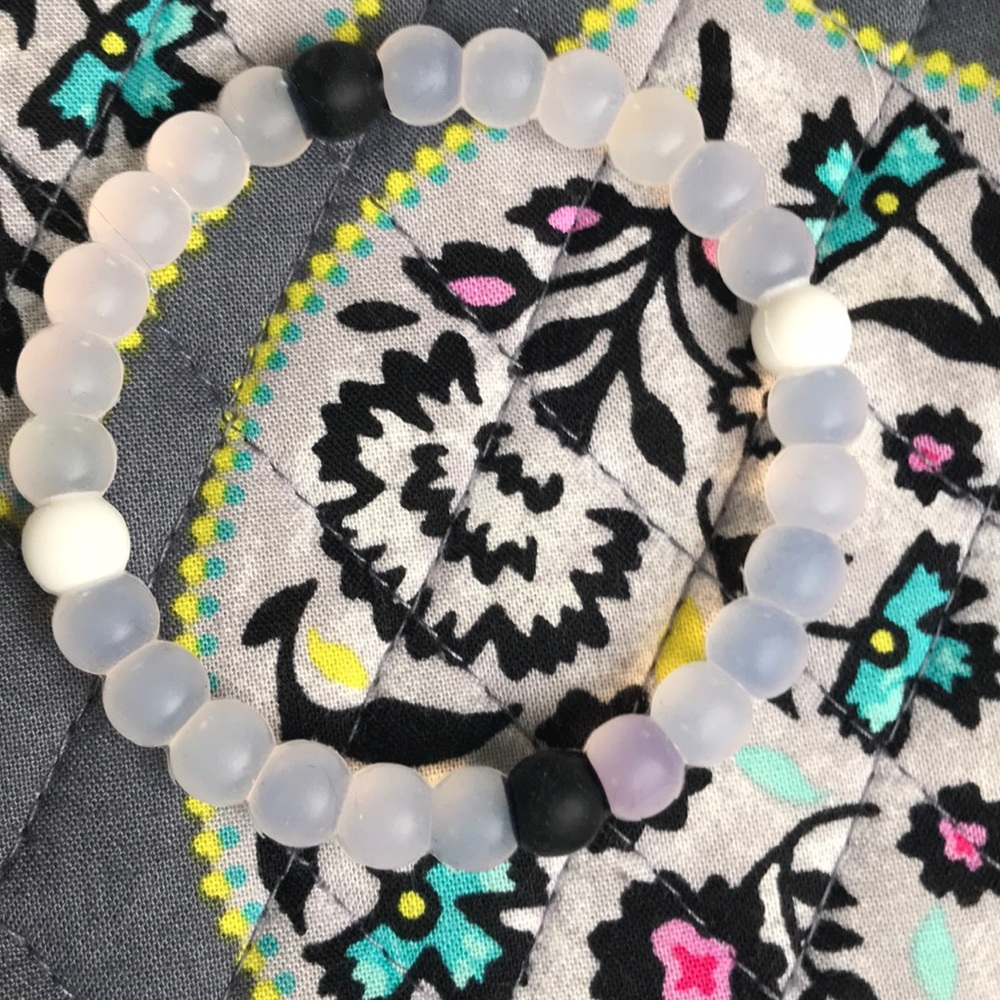 Clear Lokai bracelet with black and white beads
